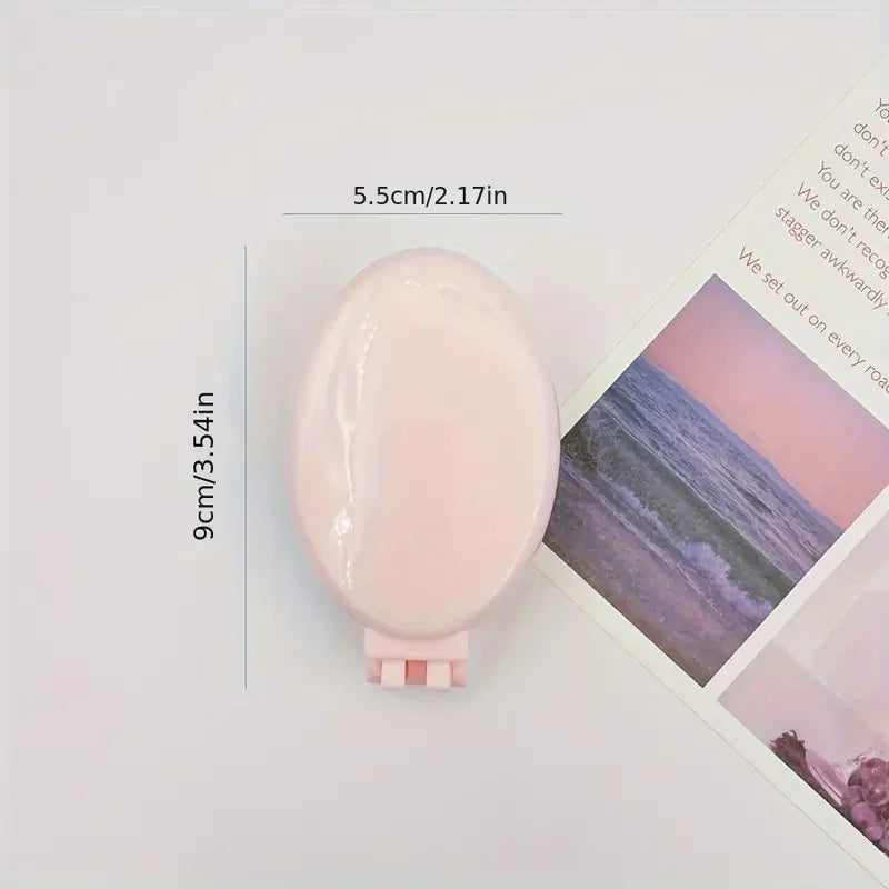 Portable Folding Hair Comb with Mirror, Lightweight & Travel-Friendly for On-the-Go Styling. A Perfect Gift for Women & Girls.