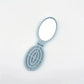 Portable Folding Hair Comb with Mirror, Lightweight & Travel-Friendly for On-the-Go Styling. A Perfect Gift for Women & Girls.